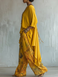 Conjunto de Pantalón Amarillo con corte asimétrico, pierna ancha y floral - Amarillo