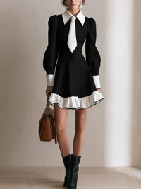 Minivestido Negro con contraste, manga farol, volante y corte en A - Negro