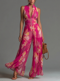 Mono Fucsia Sin Mangas con estampado floral, cremallera, plisado y pierna ancha - Fucsia