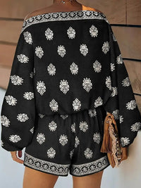 Mono con hombros descubiertos, manga farol y estampado - Negro