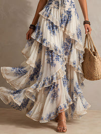 Vestido Estampado Romántico Azul con estampado floral, escote halter y volantes