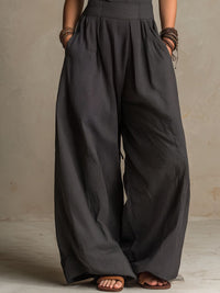 Mono Boho Gris Marengo con escote halter y pierna ancha