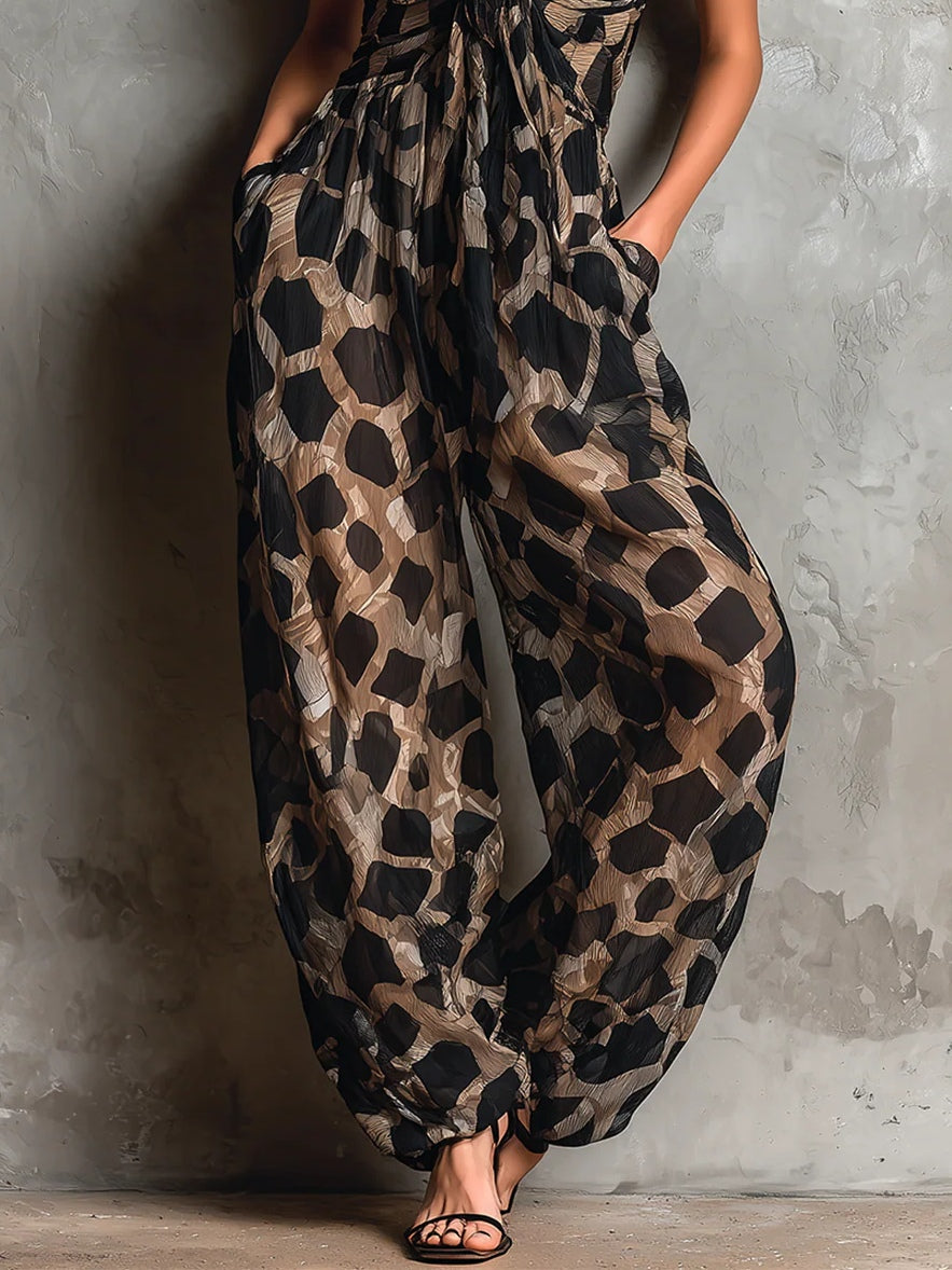 Mono Negro Corte Holgado con escote halter, gasa, pierna ancha y estampado - Negro