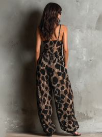 Mono Negro Corte Holgado con escote halter, gasa, pierna ancha y estampado - Negro