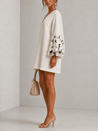 Minivestido Blanco con escote en V, manga abullonada y estampado floral - Blanco
