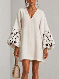 Minivestido Blanco con escote en V, manga abullonada y estampado floral - Blanco